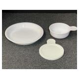 Vintage Corning pie plate, also includes a vintage Corning handled storage bowl with cover. See pictures for details.