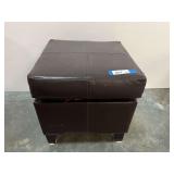Leather look storage hassock, with content. See pictures for details.