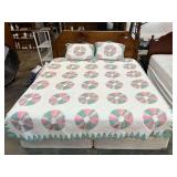 Vintage patchwork quilt, comes with matching pillow shams. Believed to be full/queen size. See pictures for details.