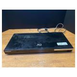 Samsung Blu-ray disc player, powers up, working condition unknown, comes with remote. See pictures for details.
