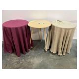 Wooden three-legged side tables, with covers, set of three. See pictures for details.