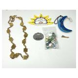 Assorted Collectibles Lot Including Gold-Tone Chain Belt, Sun and Moon Decor, Glass Marbles, and University of Georgia Souvenir