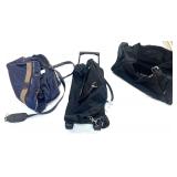 Three soft sided travel bags, see pictures for details.