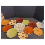 Decorative metal wall art piece with a cluster of embossed, textured plates. See pictures for details.