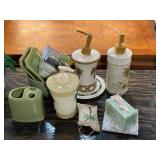 Assorted bathroom decor to include toothbrush holder, soap dispensers, soap plates, and more. See pictures for details.