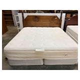 King size bed, comes with custom headboard, mattress, box springs, and bedframe. Headboard has no slots for frame, see pictures for details.