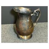 Vintage footed and plated water pitcher, see pictures or details.