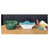 Vintage planters to include a wall pocket planter, and a vintage bird planter, believed to be vintage Royal Copley, and more. See pictures for details.