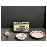 Asian themed porcelain bowl, and ladle. Also includes a porcelain trinket dish, and a sushi serving set in original box. See pictures for details.