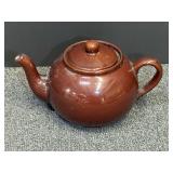 Vintage brown glazed  teapot, closely resembling a traditional Brown Betty, see pictures for details.