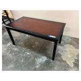 Rectangular, two toned wooden coffee table. See pictures for details.