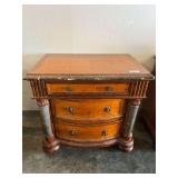 Three drawer night side table with marble accents, Lionhead ring pulls, and bun feet from Canterbury home furnishings. Matches lots 2001, 2002, and 2004. One small piece of marble accent trim is missi