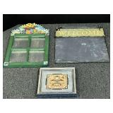Assorted home decor to include a Navajo sand painting, welcome sign made from slate, and more. Three pieces total, see pictures for details.