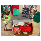 Assorted dish towels, mostly seasonal, cloth and napkins, and more. See pictures for details.