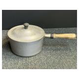Vintage Club aluminum sauce pot, with wooden handle, see pictures for details.