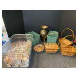 Assortment of home decor to include a brass vase, small woven baskets, and a seashell collection. See pictures for details.