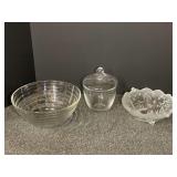 Ribbed mixing bowl, footed Christmas bowl, and covered glass storage jar. See pictures for details.