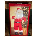 Jingle bell rock Santa, working condition unknown, comes in original box. See pictures for details.