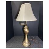 Brass finish, swing arm table lamp. See pictures for details.