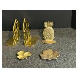 Brass book ends and assorted home decor, see pictures for details.