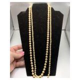 2 VINTAGE FAUX PEARL CREAM NECKLACES (BOTH 28" LONG)