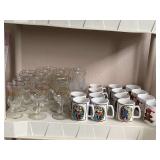 SHELF LOT TO INCLUDE 14 CHRISTMAS COFFEE MUGS & 14 CHRISTMAS GLASSES