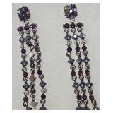 Long, Multi-Strand Chandelier Dangle Earrings Featuring Dark Metal Settings with Purple, Lavender, and Champagne-Colored Rhinestones