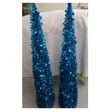 Set of 2 Blue Collapsible Lighted Christmas Trees. Very Pretty. Lights Have Not Been Strung on the Trees but Does Come With.