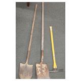 Three Traditional Digging and Landscaping Tools: a Round-Point Shovel, a Flat Square-Point Shovel, and a Pickaxe.