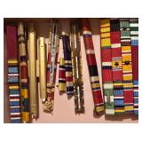 United States Military Sliding Ribbon Bars and Mounting Brackets Primarily from the World War II Era.