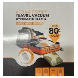 Rechargeable Travel Vacuum Storage  Bags With Cordless Vacuum Pump Stock Photos