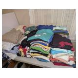 ALL LADIES SHIRTS, SWEATER, AND MORE IN RIGHT TABLE TOP AREA MARKED 1090 - BR1