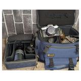 VINTAGE MINOLTA X370 35MM FILM CAMERA AND ACCESSORIES WITH TWO BAGS INCLUDING ZOOM LENS, WIDE ANGLE LENS, 50 MM LENS, AND 2X CONVERTER