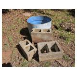 FOUR CONCRETE BLOCKS AND HALF POLY DRUM
