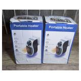 PAIR OF DIRECT OUTLET PLUG-IN PORTABLE HEATERS WITH ORIGINAL BOXES