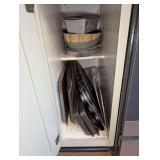 BAKING PANS AND SHEETS IN LOW CABINET MARKED 1172