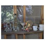 DECORATIVE AND COLLECTIBLE ITEMS ON SHELF SECTION MARKED 3184 INCLUDING COCA-COLA CARAFE, GLASS TEDDY BEAR BANK, COLLAGE FINISH ELEPHANT FIGURINE, HAND MADE AND HAND SIGNED DECORATIVE POTTERY BOWL, AN