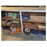 CONTENTS OF FLOOR CABINET MARKED 3069 INCLUDING WHEELBARROW WHEEL AND TIRE, DROP CORD, ANT KILLER, BATHROOM LIGHT FIXTURES, GUN CLEANING SUPPLIES, FLASHLIGHTS, AND MORE