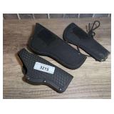 THREE PISTOL HOLSTERS