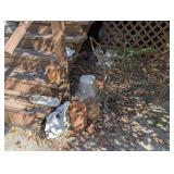ALL ITEMS IN DECK STAIRS AREA MARKED 4007 INCLUDING TERRACOTTA PLANTERS, WROUGHT IRON PLANTER STANDS, TERRACOTTA BIRDHOUSE, DECORATIVE PLANTERS, GIANT CONCH SEASHELL, AND MORE