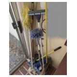 MOPS, BROOMS, DUSTERS, AND MORE IN CORNER MARKED 1245