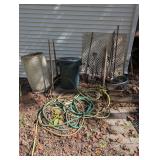 ALL ITEMS INSIDE YARD AREA MARKED 4005 INCLUDING POLY DRUM, RUBBERMAID BRUTE GARBAGE CAN, WATER HOSES, GARDEN TOOLS, AND MORE