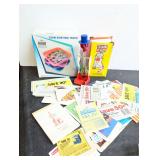 Assorted Collectibles Lot Including Dunking Bird, Nadex Coin Sorting Trays, Talking Toilet Novelty Toy, and Envelope FULL of Vintage Coupons 'NO EXPIRATION DATE'