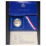 1986 United States Liberty Ellis Island Proof Silver Dollar with Original Presentation Case and Certificate of Specifications