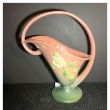 DR…Roseville art pottery handled basket in the popular "White Rose" pattern, see pictures for details.