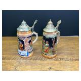 Pair of German Ceramic Beer Steins with Metal Lids