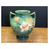 DR…Roseville art pottery from the "Magnolia" line, which was first introduced by the Roseville Pottery Company in 1943. See pictures for details.