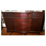 DR… Lovely mid-century modern sideboard with five drawers and two side cabinets. Believed to be Duncan Phyfe, see pictures for details.