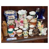 Large Assortment of Ceramic and Glass Collectibles Including Figurines, Toby Mugs, and Pottery