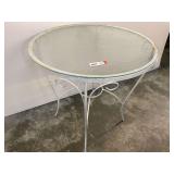 Round Glass Top Table with White Metal Scroll Base